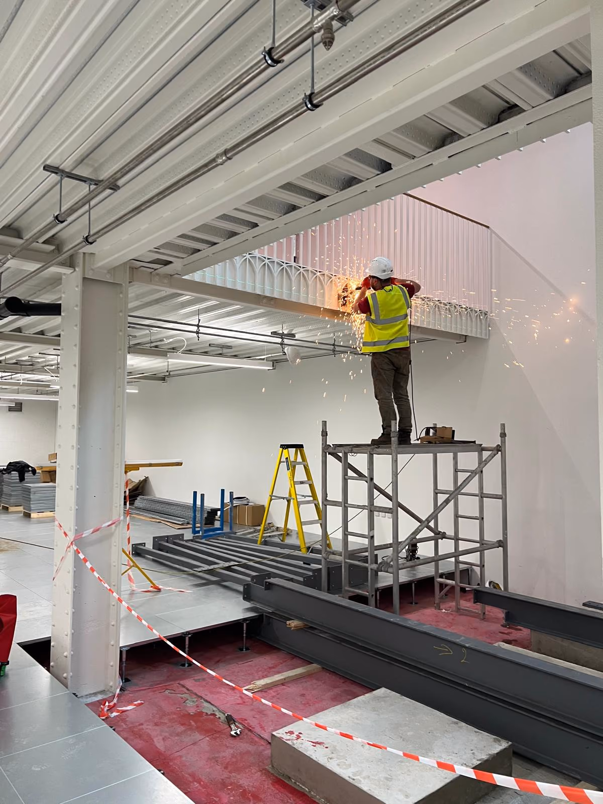 Steel mezzanine installation in progress at Short's Gardens, WC2H