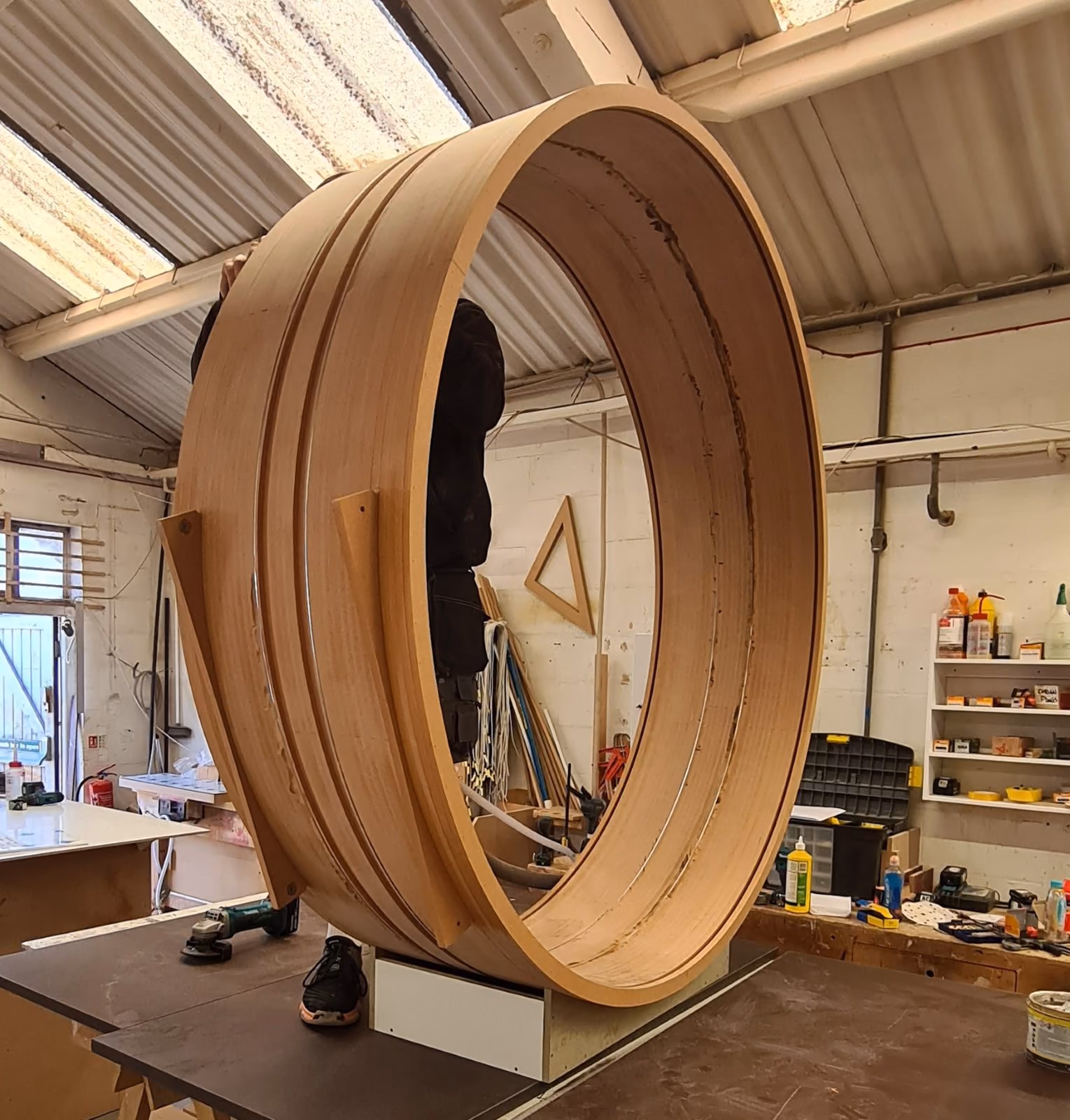 Large laminated timber ring being fabricated for the Selfridges display