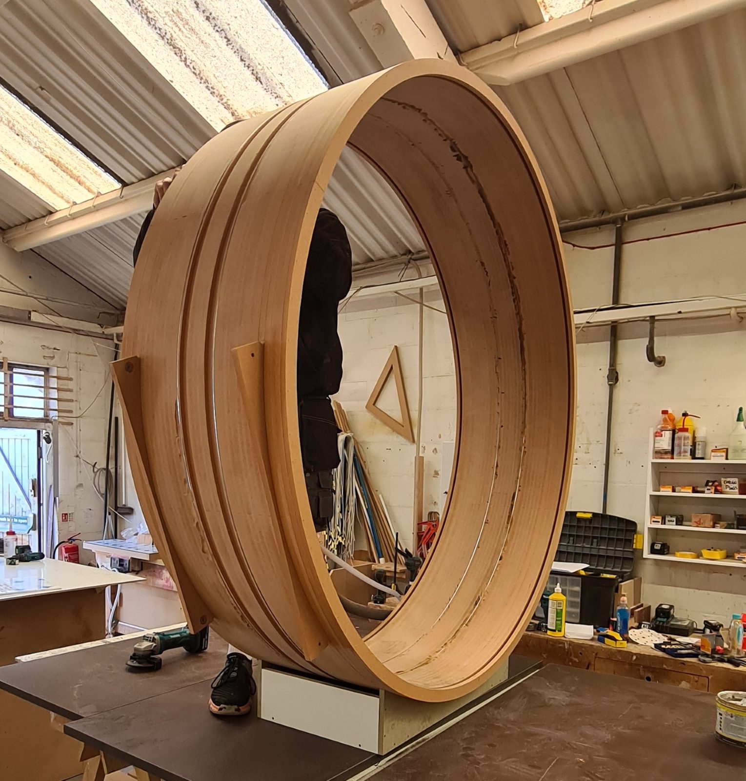 Large laminated timber ring being fabricated for the Selfridges display