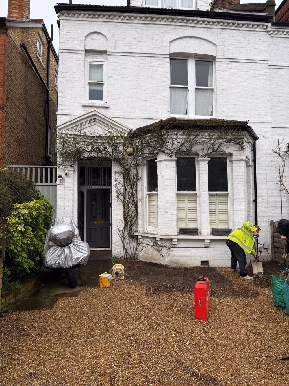 Front elevation of a Victorian London property undergoing structural site investigation
