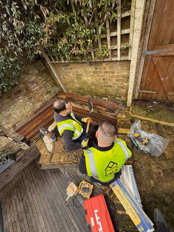 EMA site team carrying out trial pit and opening-up works in a London garden